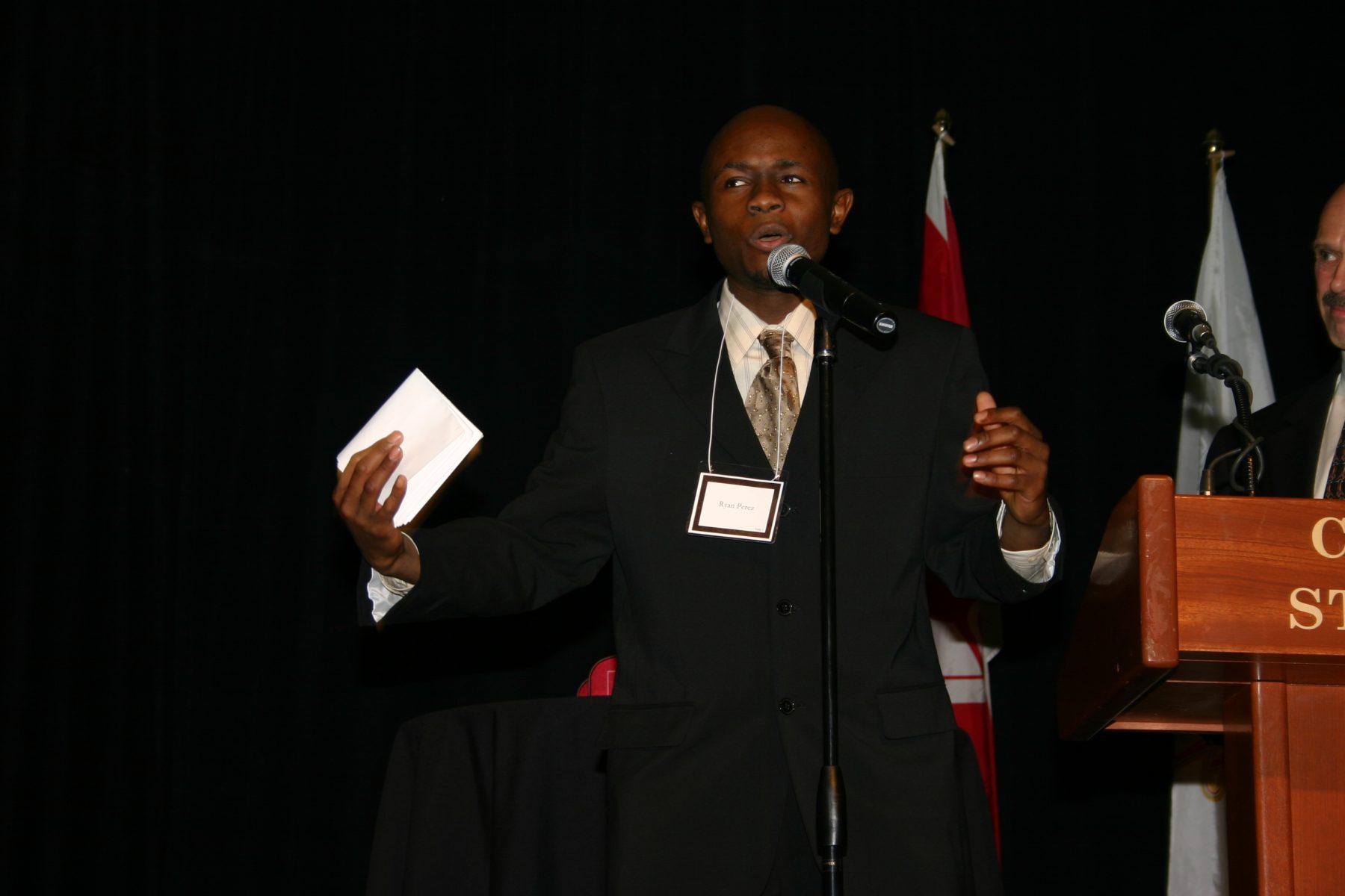 Ryan Perez at the Calgary Stampede podium, accepting the Western Legacy Award